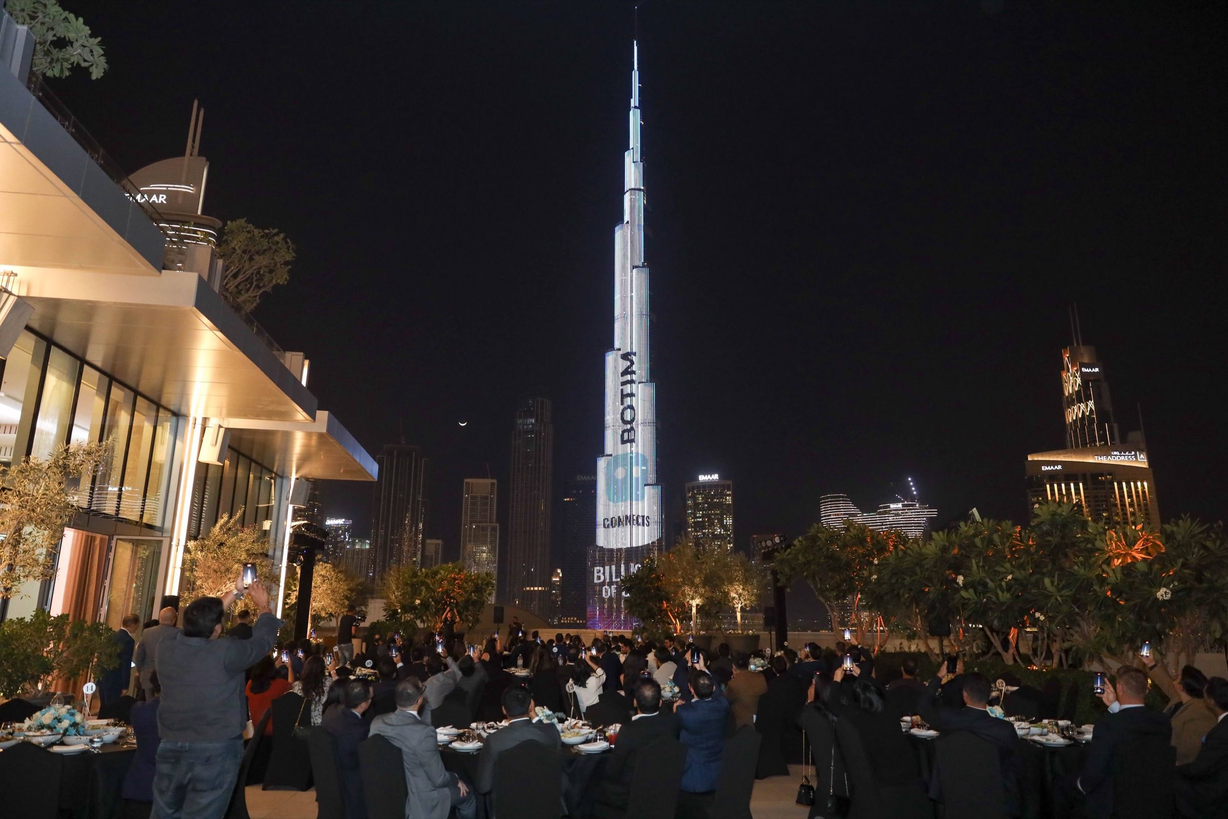 Evening event in Downtown Dubai with the Burj Khalifa lit up behind