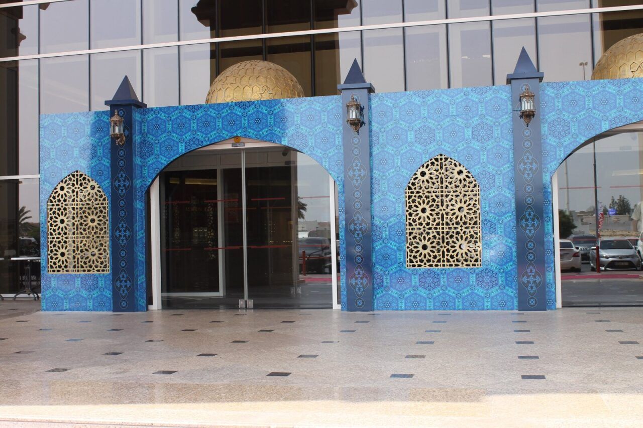 Blue Moroccan-style entrance arch built for a themed event