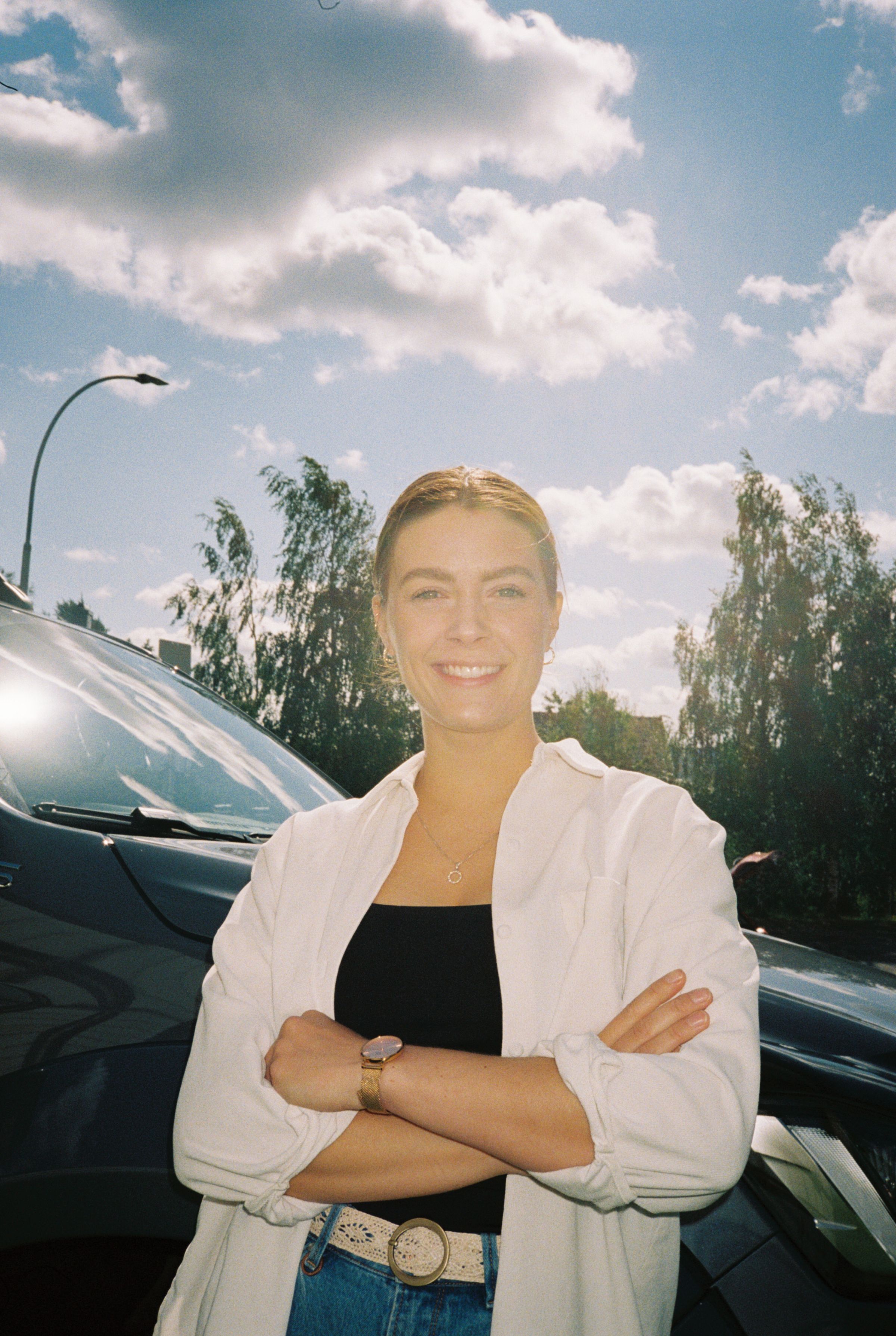 Runa Kvendseth standing with arms crossed in chef's attire