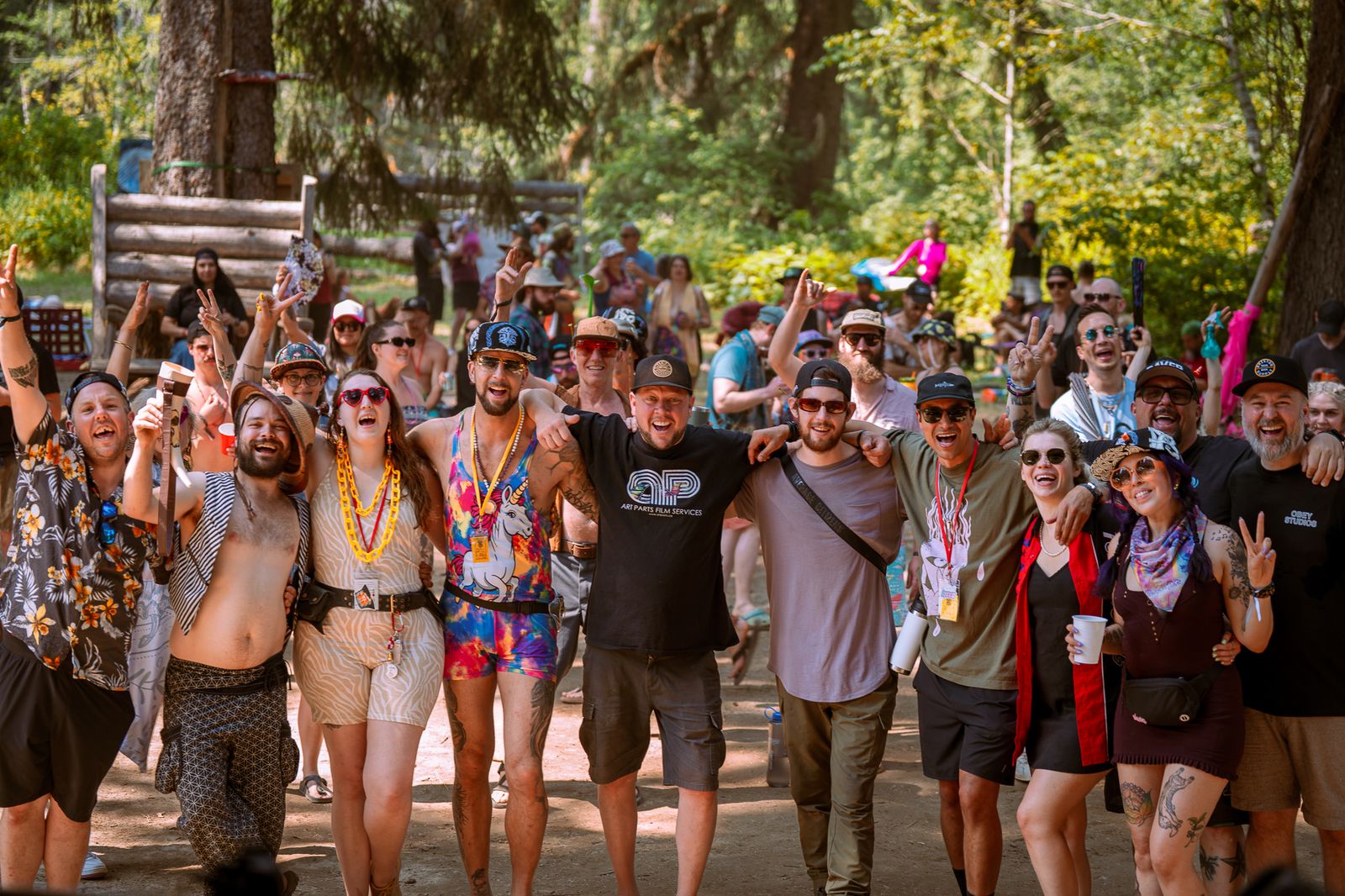 Large group of happy festival attendees posing