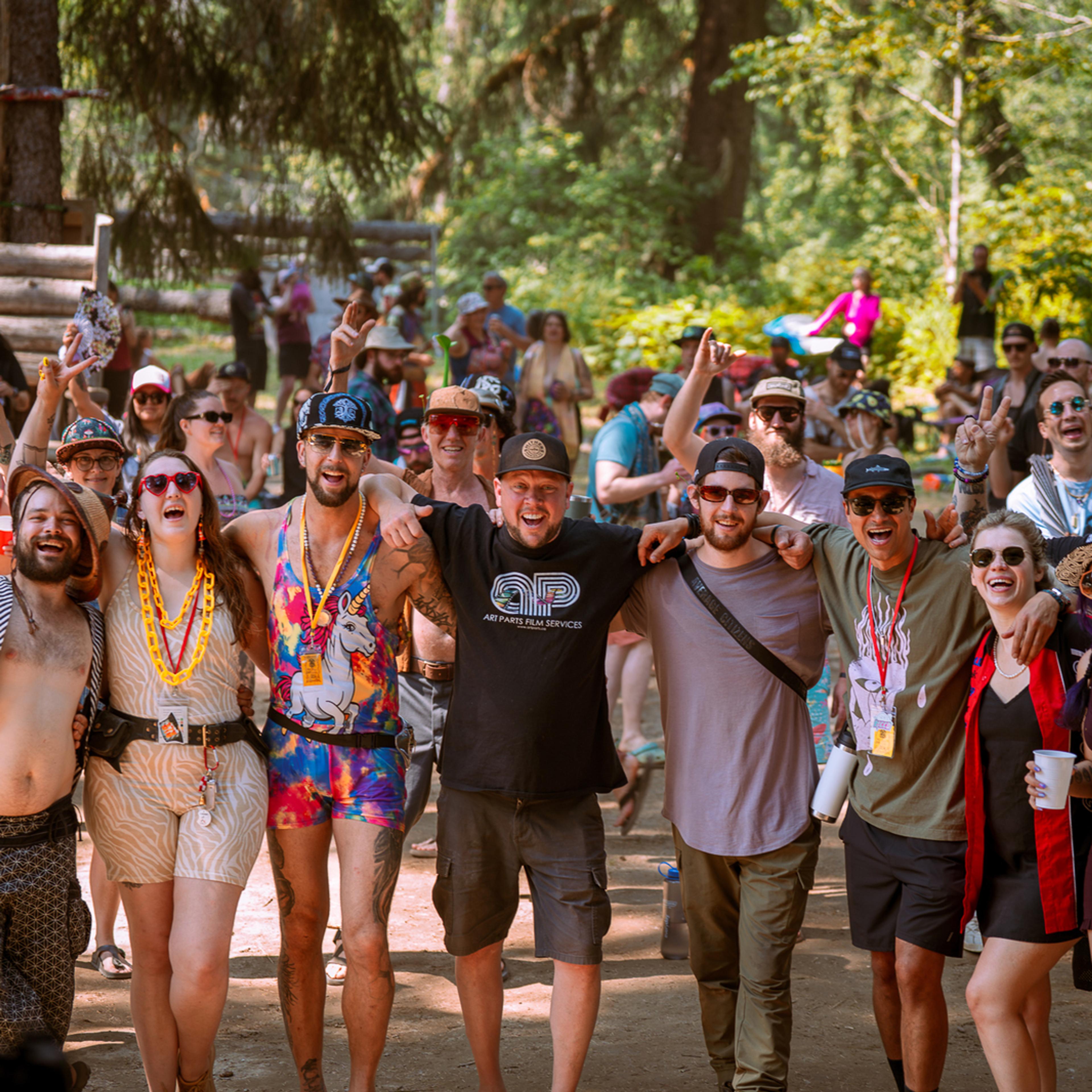 Large group of happy festival attendees posing