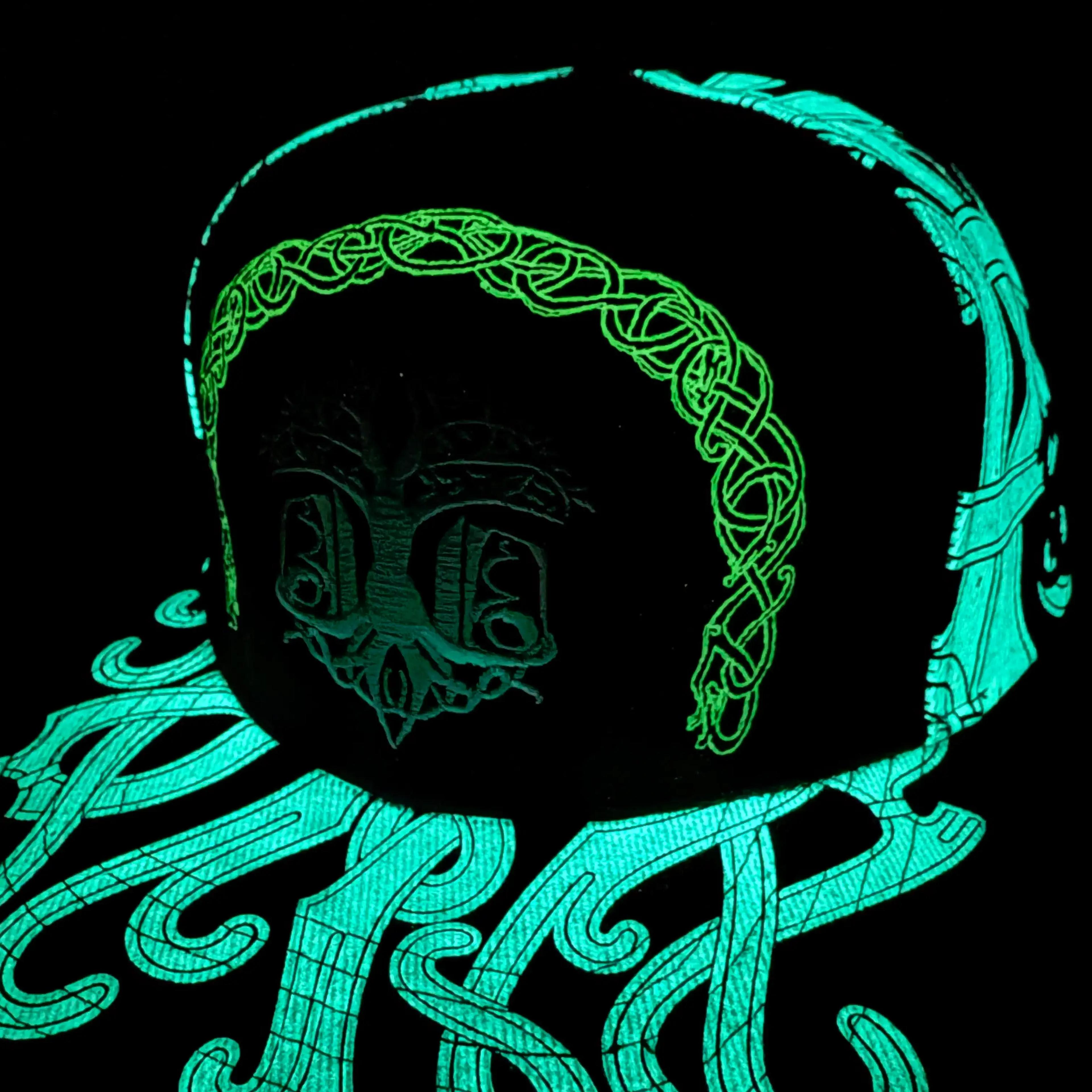 ValhallaFest glow-in-the-dark hat glowing in darkness