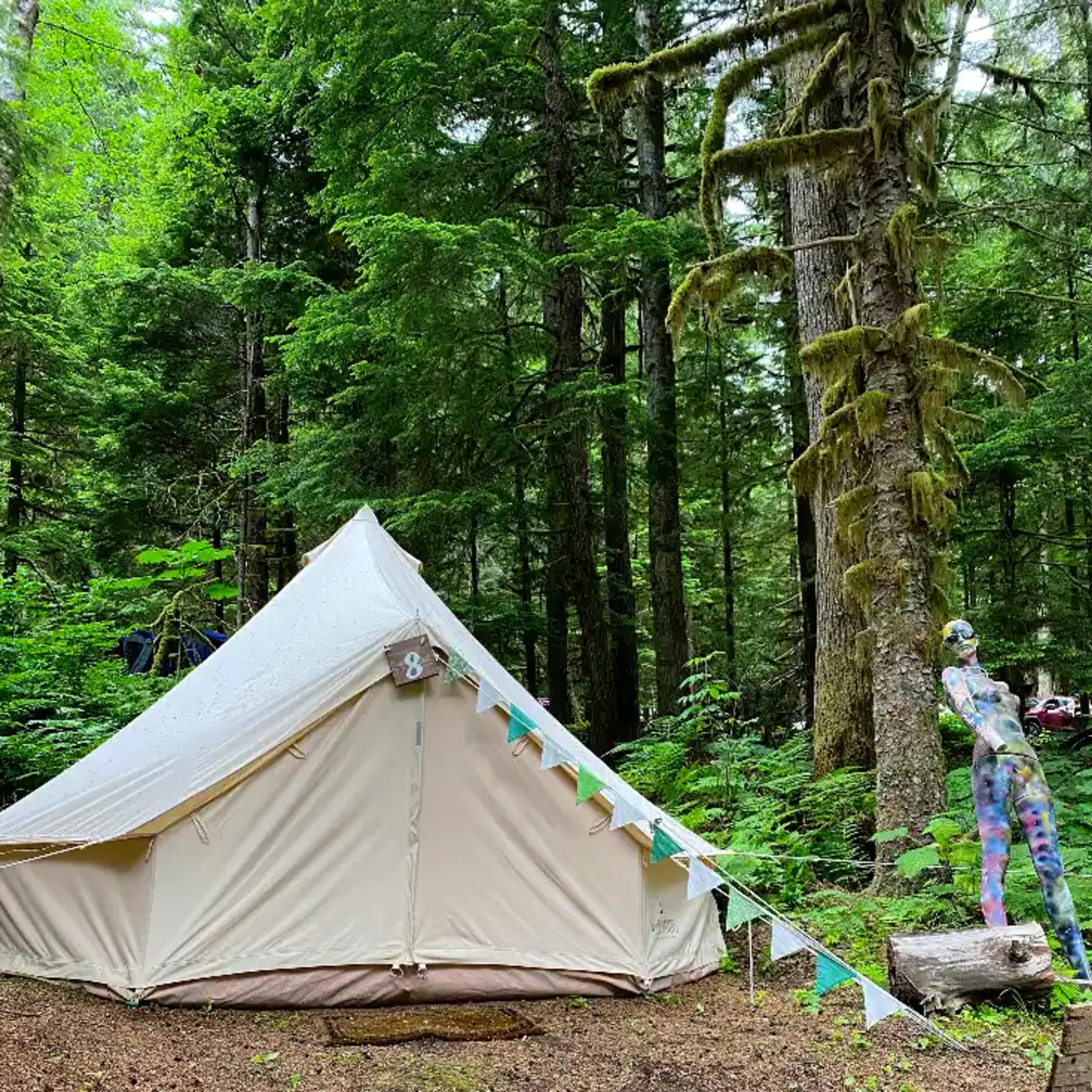 White canvas bell tent set up at ValhallaFest