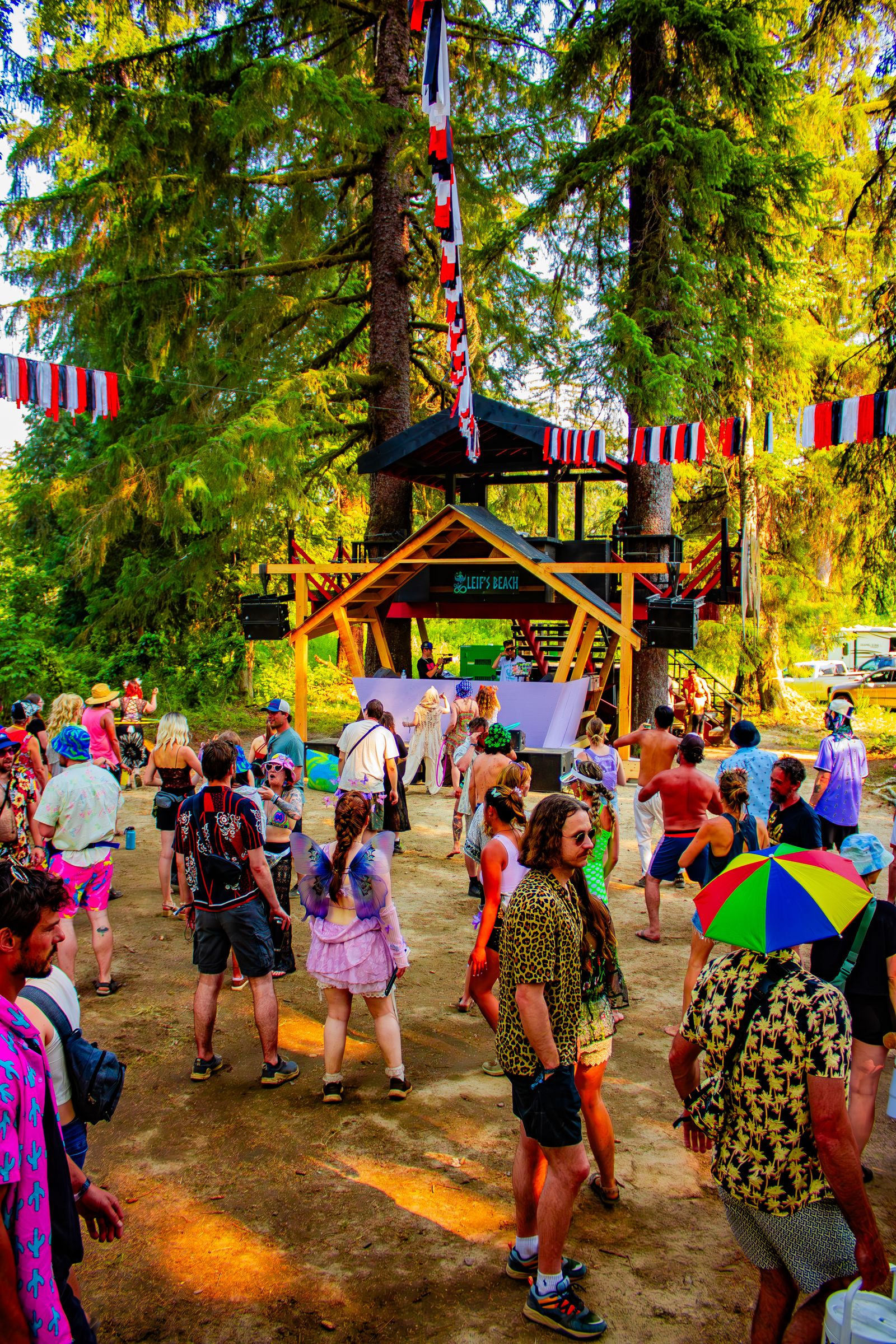 Colorful festival crowd at Leifs Beach stage
