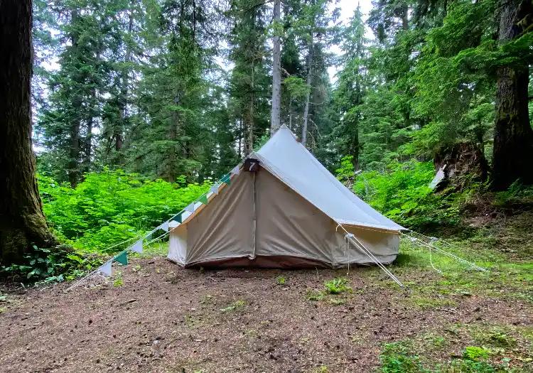 White canvas bell tent set up at ValhallaFest