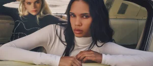 Women in a vintage car wearing Dolly's Joleans