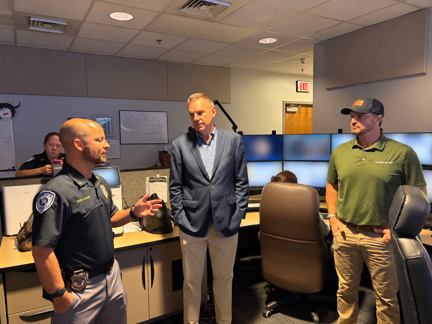 UNCG Police Chief Jason speaks with Rep. Richard Hudson and a ZeroEyes representative during a campus gun detection technology demonstration