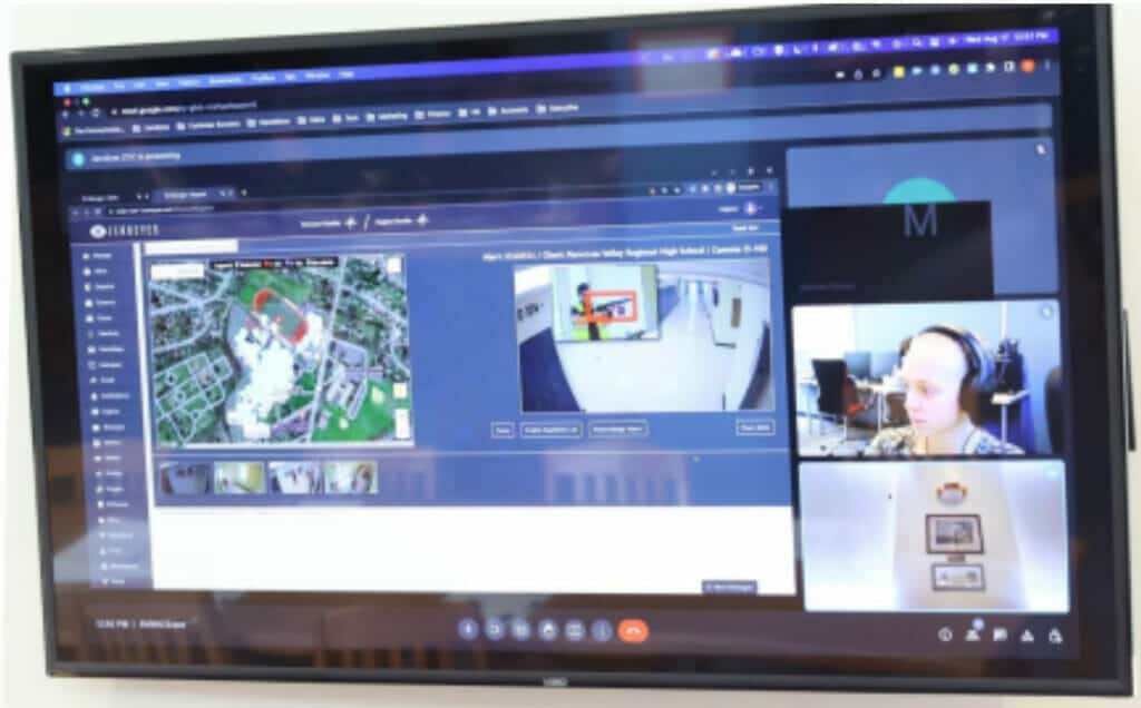 a computer monitor shows a ZOC dashboard