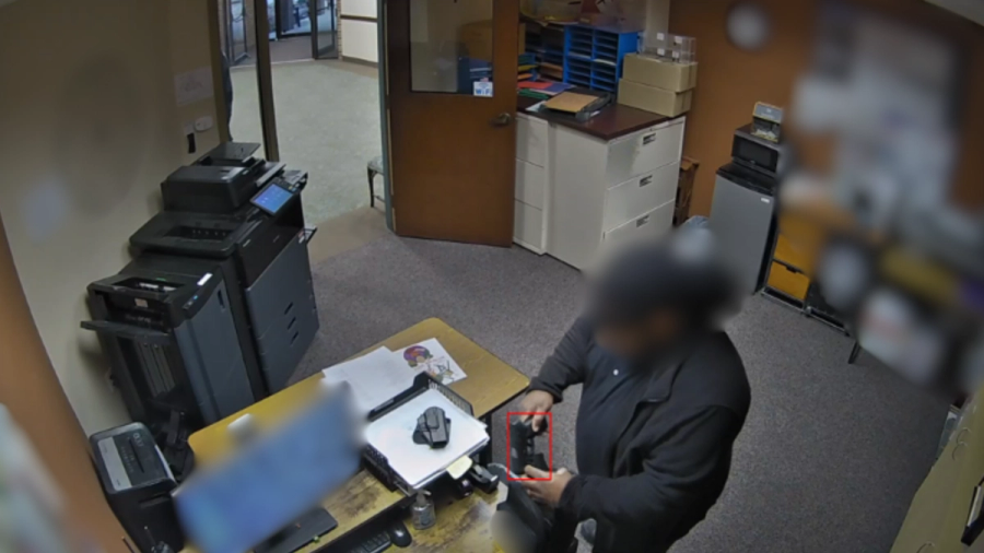 Sanitized weapon detection still from an office camera