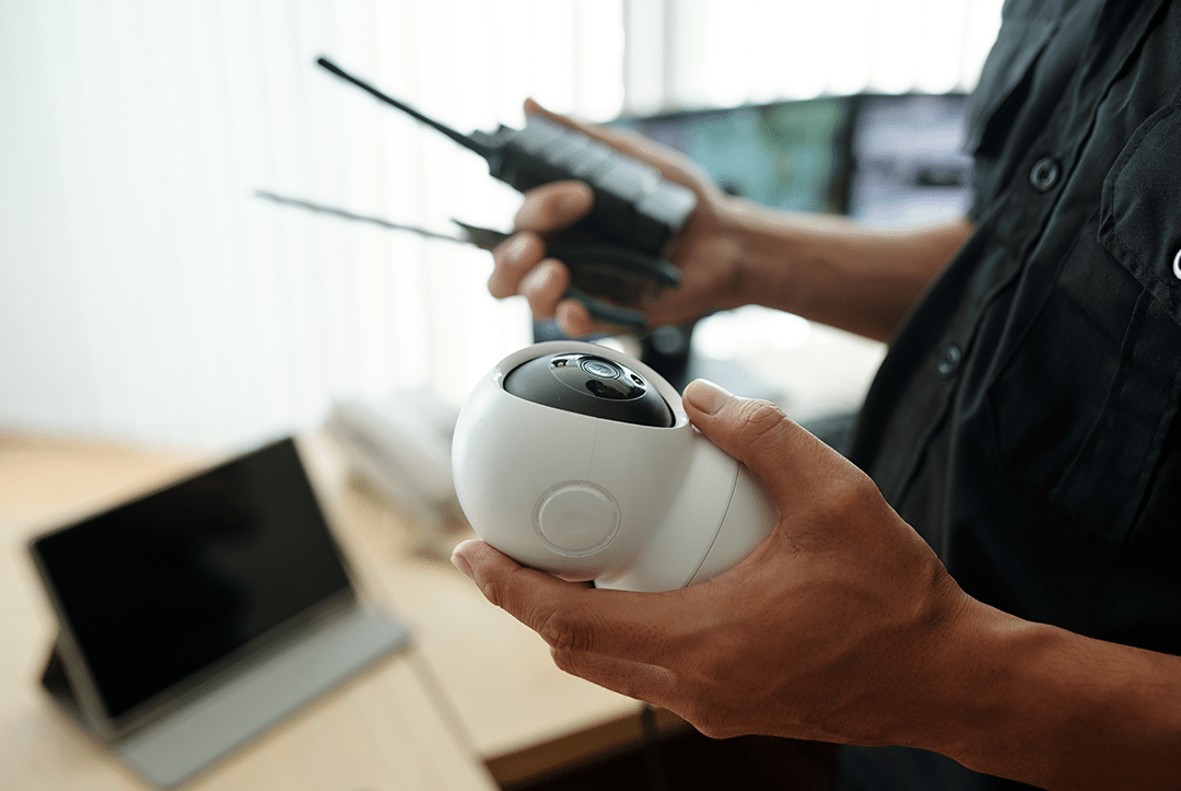 Security Guard Holding Camera