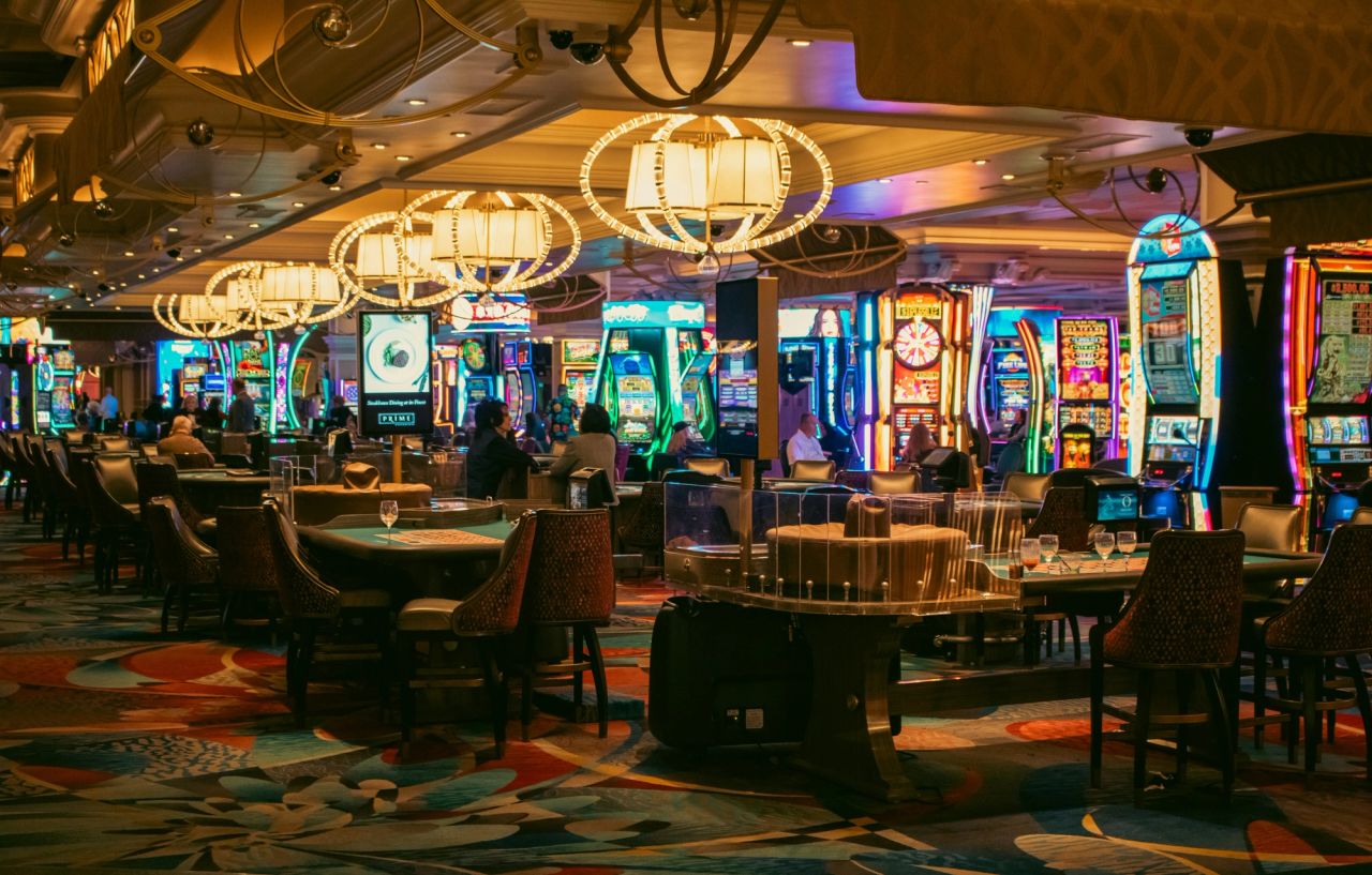 Casino gaming floor with slot machines and ambient lighting