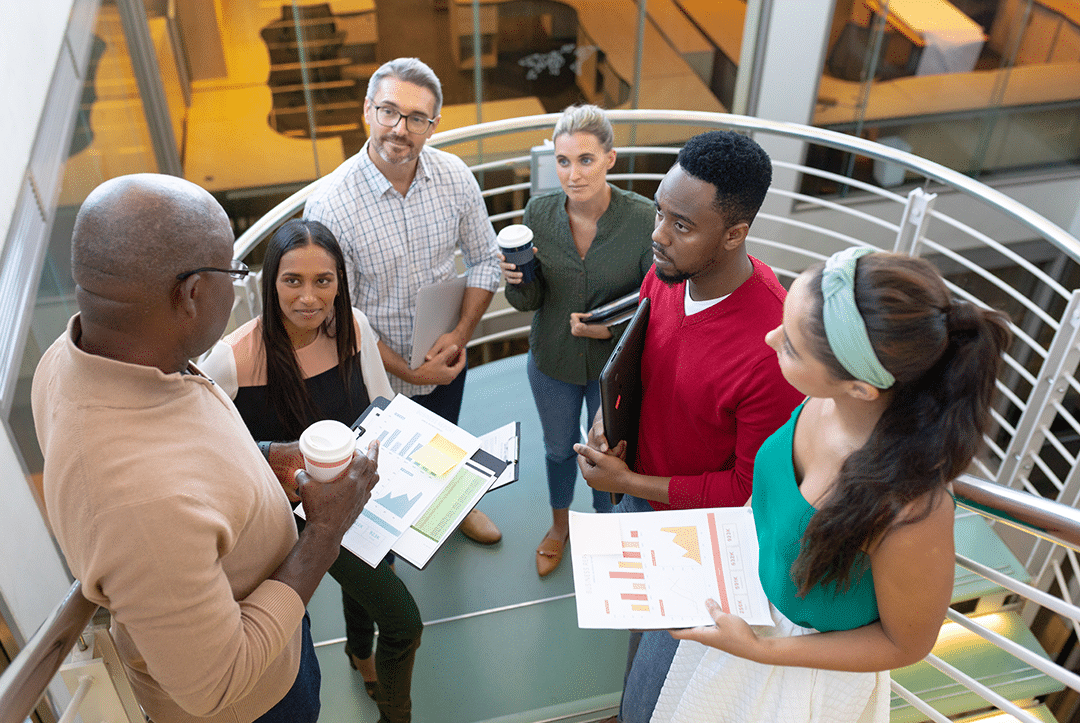Corporate office building stairway meeting