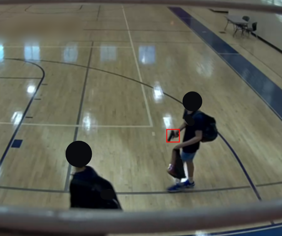 Sanitized weapon detection still from a gymnasium camera