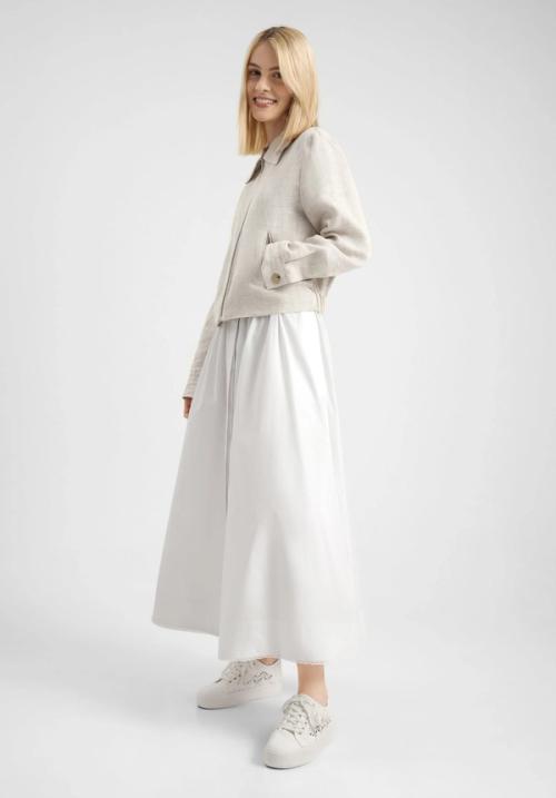 Jacket on-model photography with skirt styling — womenswear ecommerce GoPackshot