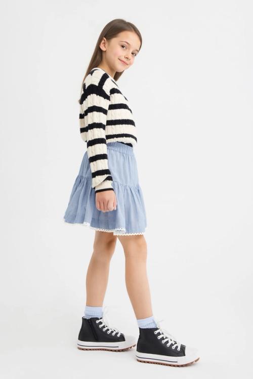 Kids sweater and skirt on-model photography — childrenswear ecommerce GoPackshot
