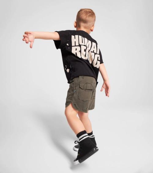 Kids t-shirt outfit on-model photography in studio — childrenswear ecommerce GoPackshot