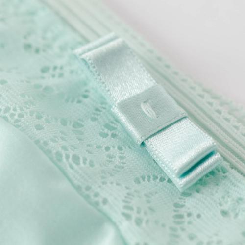 Lingerie satin bow detail macro photography — product detail GoPackshot