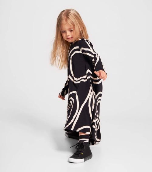 Kids dress on-model photography in studio — childrenswear ecommerce GoPackshot