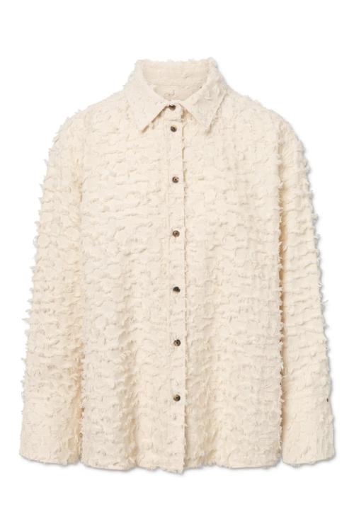 Shirt flat-lay packshot on white background — womenswear ecommerce GoPackshot