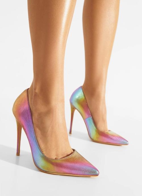 Pump on-model photography with statement heel on white background — GoPackshot