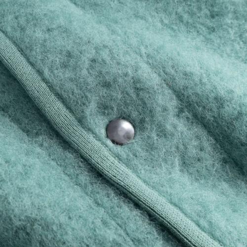 Cardigan button detail close-up photography — womenswear ecommerce GoPackshot