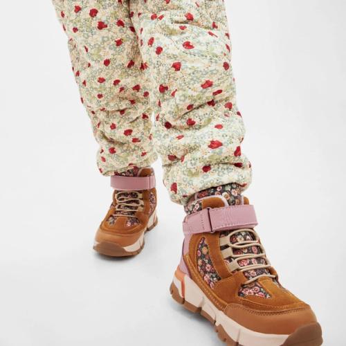 Kids hiking boot on-model photography with styled outfit — GoPackshot studio