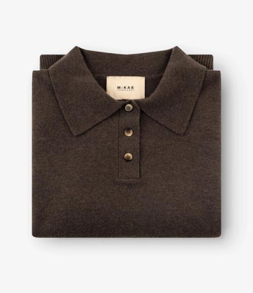 Shirt folded flat-lay packshot on white background — womenswear ecommerce GoPackshot