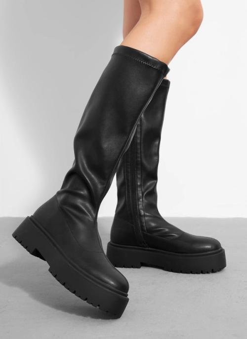 Knee-high platform boot on-model photography in studio — GoPackshot studio