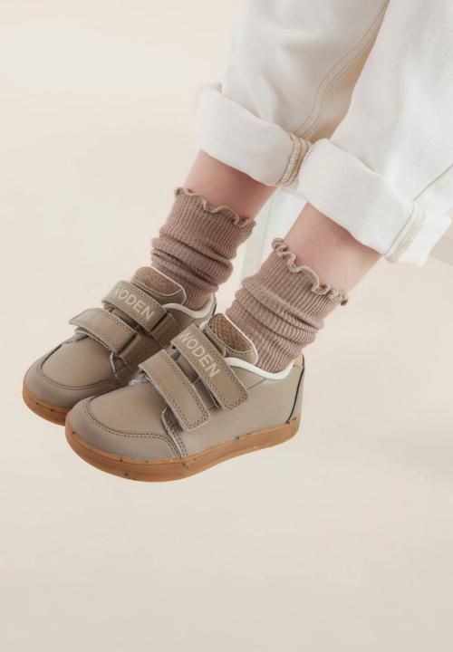 Toddler sneaker on-model photography with cozy styling — GoPackshot studio