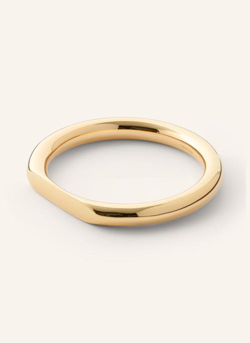 Gold bangle bracelet packshot on neutral background — jewellery photography GoPackshot