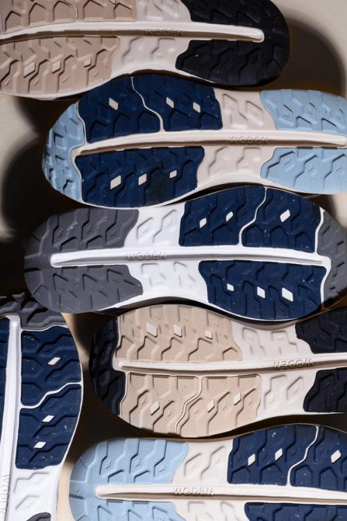 Sneaker sole collection overhead flat lay photography — GoPackshot studio