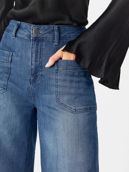 Jeans front pocket detail on model — denim studio GoPackshot