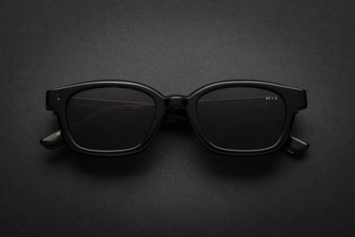 Sunglasses on dark background — moody eyewear product photography GoPackshot