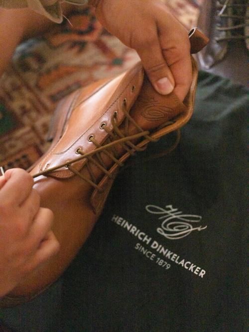 Artisan shoe craftsmanship hand-lacing detail photography — GoPackshot studio