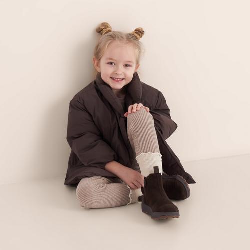 Kids suede boot on-model photography in studio — footwear ecommerce GoPackshot