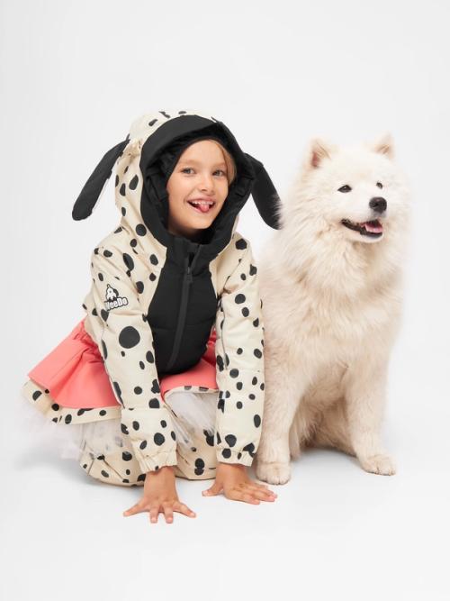 Kids snowsuit on-model photography with props — childrenswear studio GoPackshot