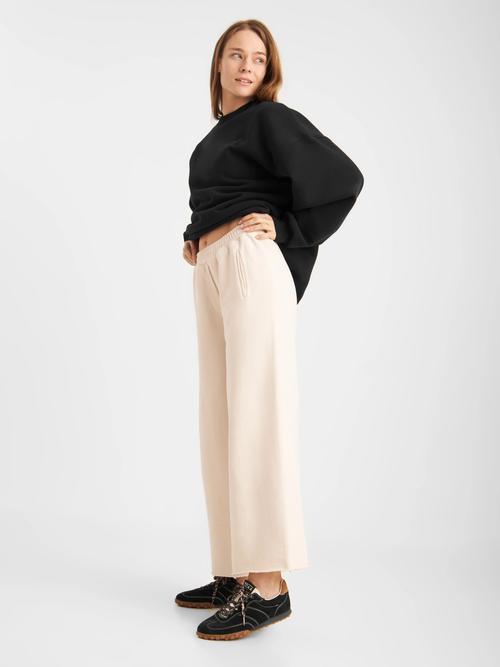 Knit sweater and wide trousers on-model photography — womenswear ecommerce GoPackshot