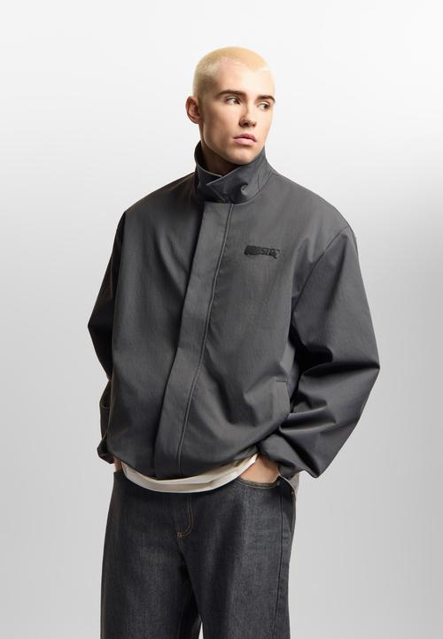 Men's grey jacket on-model photography in studio — menswear ecommerce GoPackshot