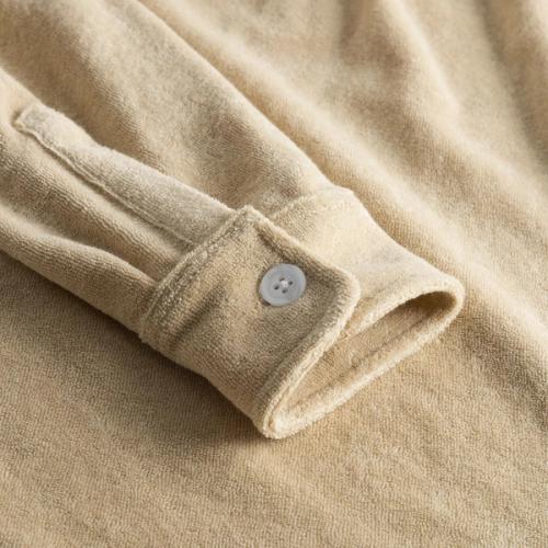 Shirt cuff button detail close-up photography — womenswear ecommerce GoPackshot