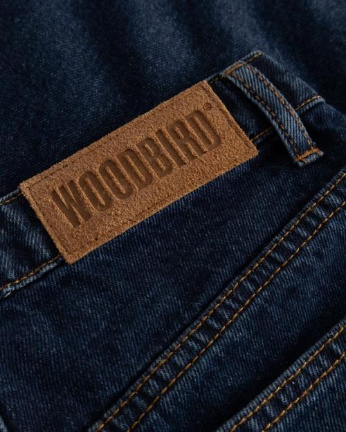 Jeans leather patch detail macro — denim studio GoPackshot