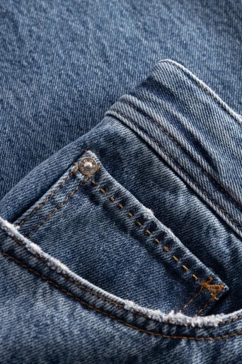 Jeans coin pocket and rivet detail — macro studio GoPackshot