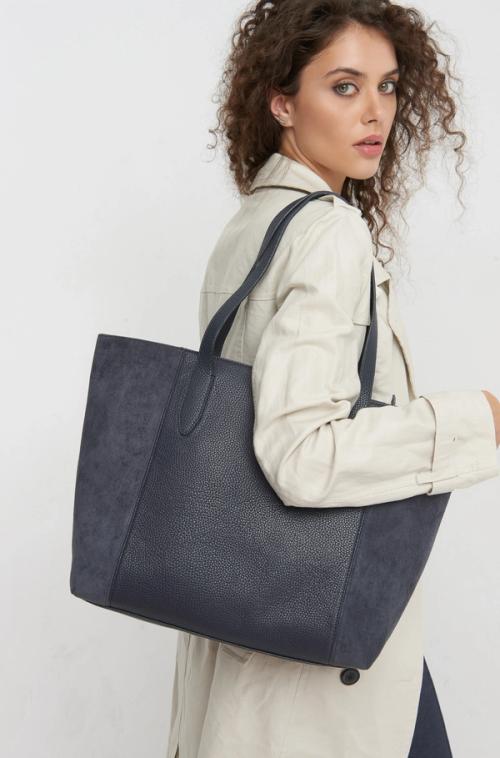 Tote bag on-model lifestyle with trenchcoat — GoPackshot studio
