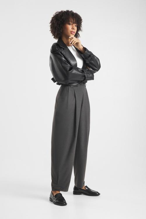 Tailored trousers on-model photography with leather jacket — womenswear GoPackshot