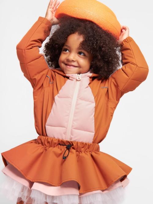 Kids puffer jacket on-model photography in studio — childrenswear ecommerce GoPackshot