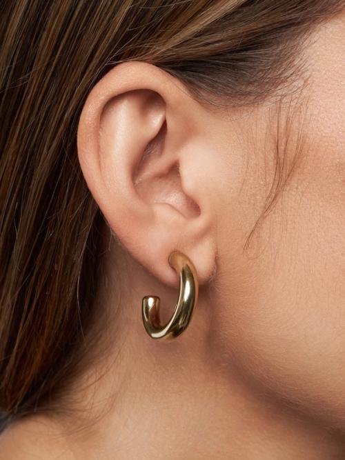 Earring on-model close-up showing thick hoop fit — jewellery photography GoPackshot