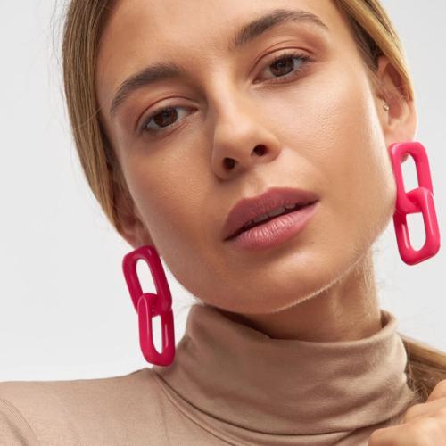 Earrings on-model showing drop length and styling — jewellery photography GoPackshot