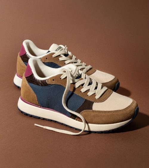 Sneaker styled packshot on matching color background — GoPackshot studio