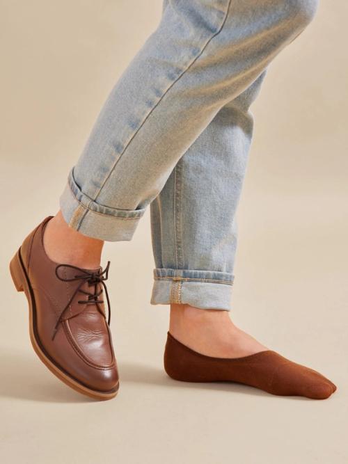 Derby shoe on-model photography with casual denim styling — GoPackshot