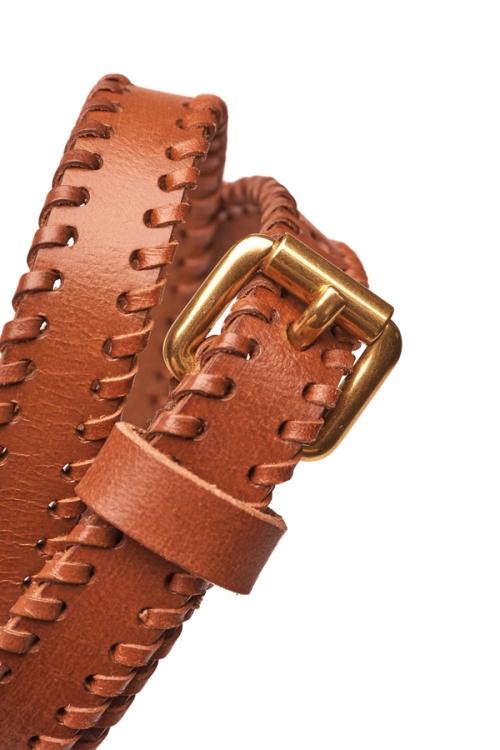 Belt buckle detail photography on white for accessories