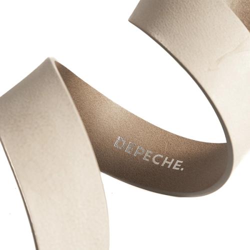 Belt detail photography on white background for ecommerce